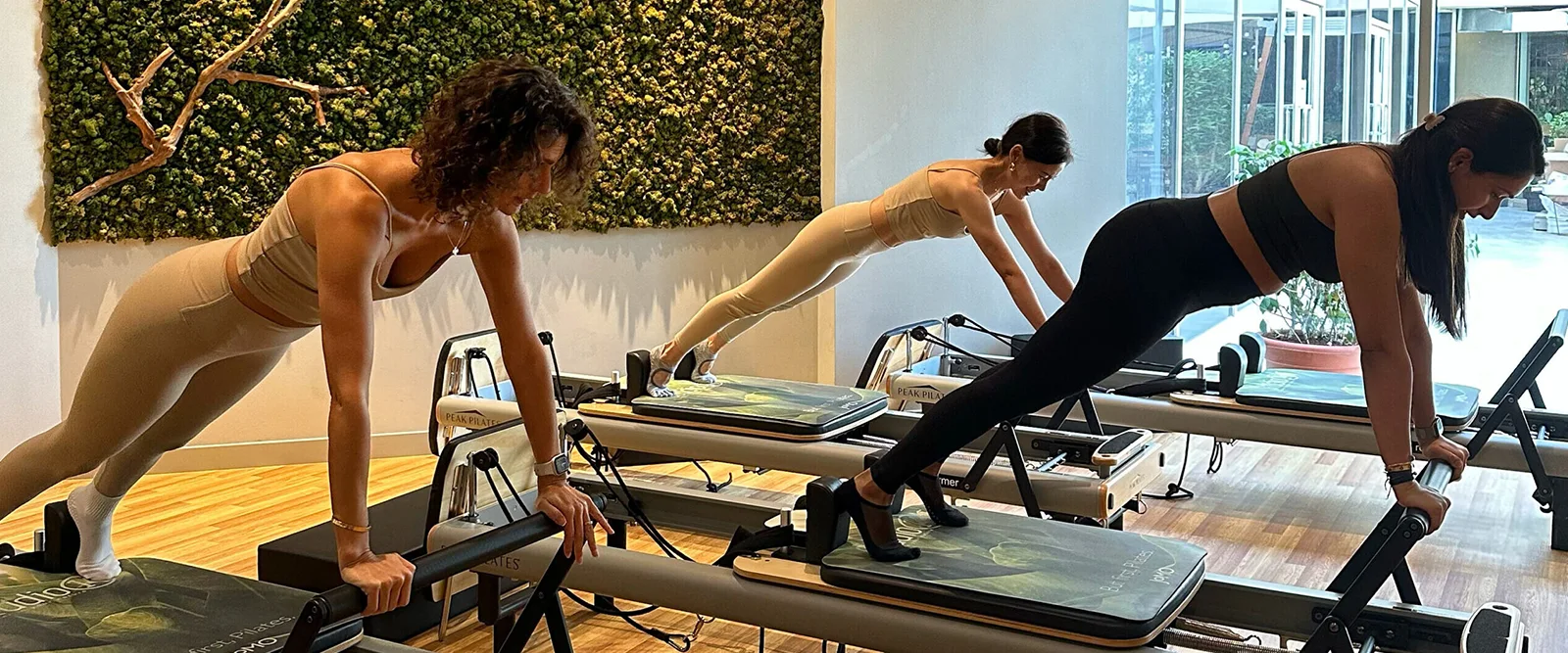 Reformer Pilates equipment in a Studio14 studio interior